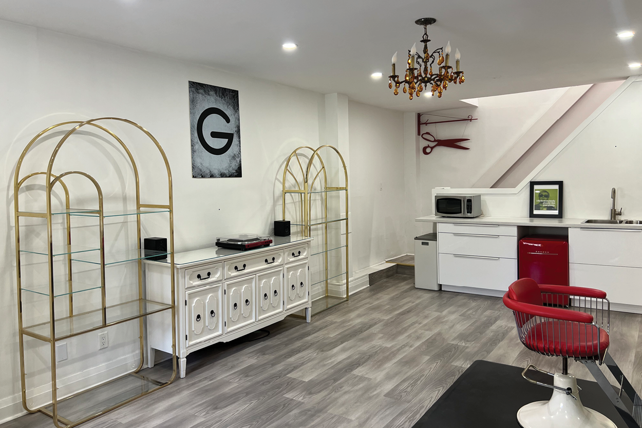 17 Stephanie Street retail shelving and kitchen setup in salon space