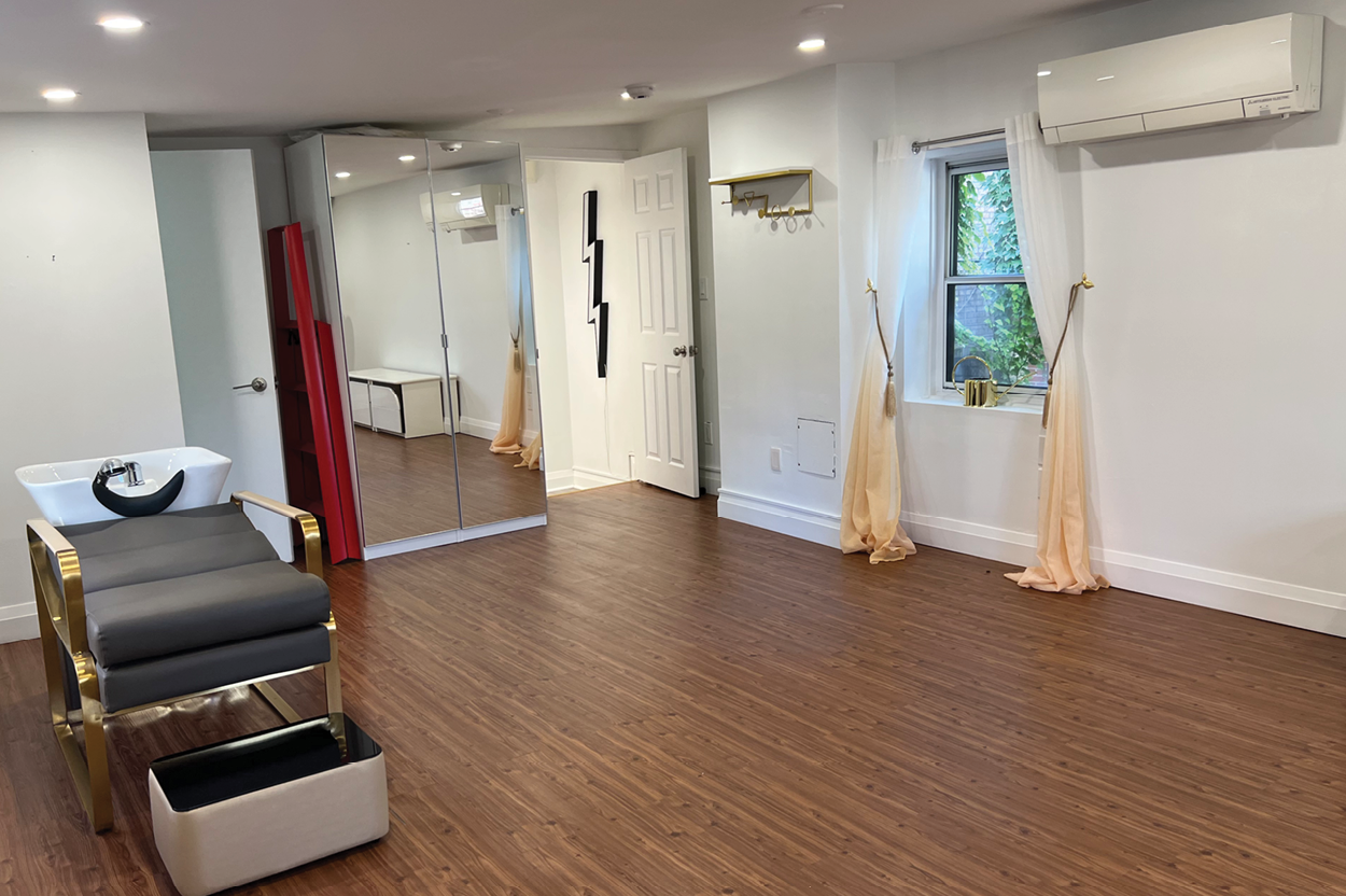 17 Stephanie Street salon space with mirrored closet and white sink