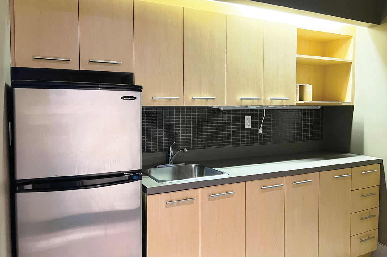 191 John Street close-up of kitchenette with stainless steel fridge
