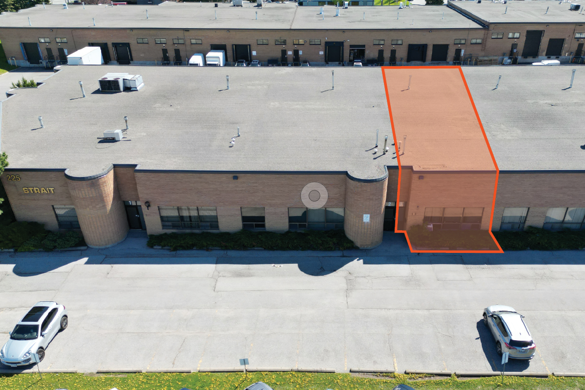225 Nugget Avenue aerial front view of one storey brick building with parking and orange outline of the available unit 3