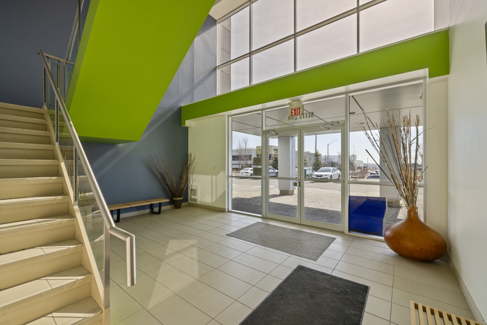 30 Via Renzo Drive interior of front entrance doors with stairs leading up to the second floor 