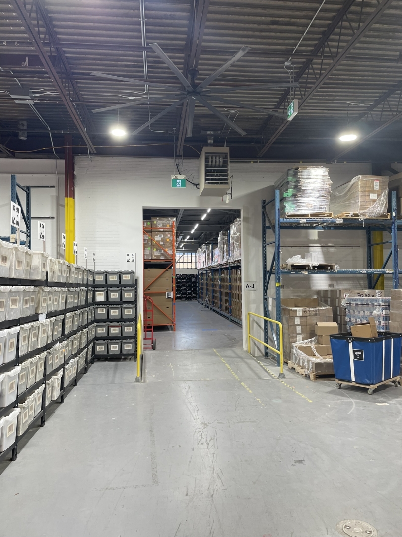 48-54 Carnforth Rd interior warehouse with concrete floor and storage along walls 