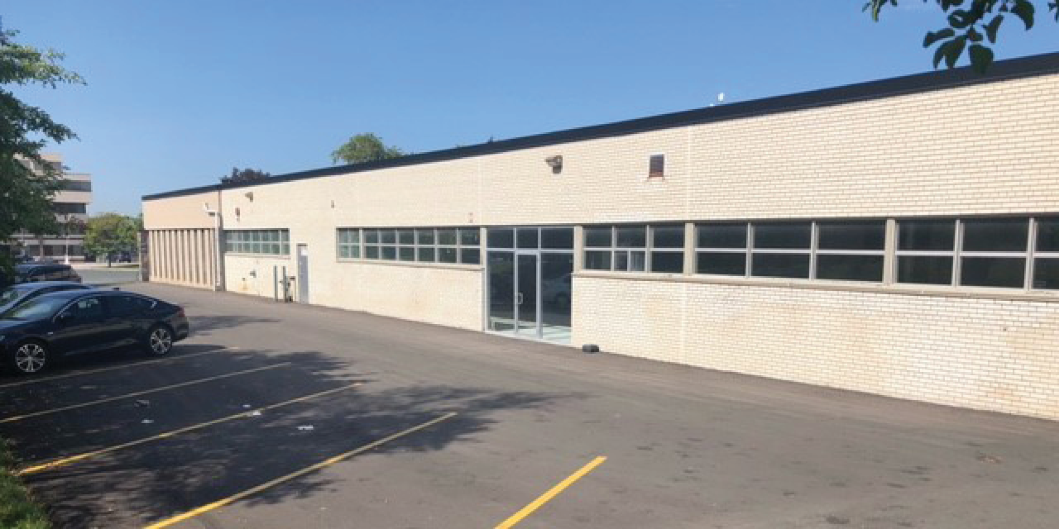 55 Gervais Drive Exterior with side doors and windows