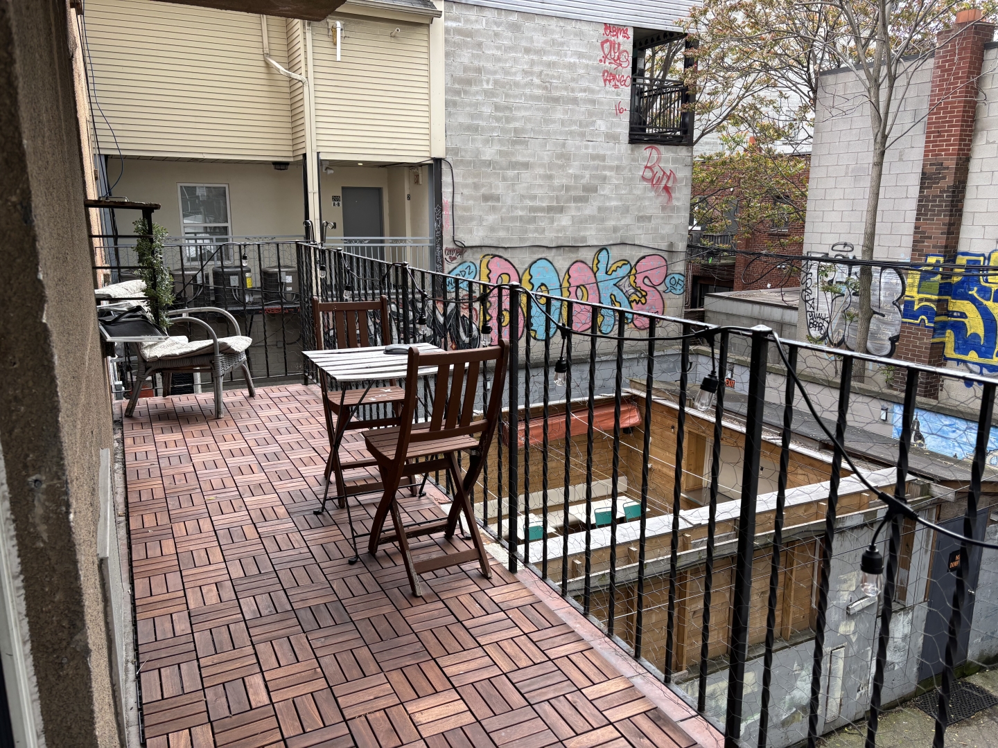 58-60 Kensington Avenue Unit 204 balcony with a small table and 2 chairs