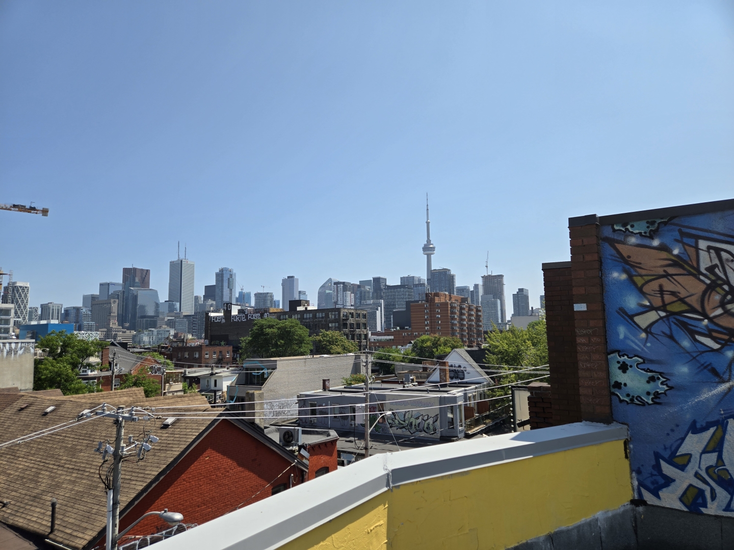 58-60 Kensington Avenue newly painted rooftop view of downtown Toronto