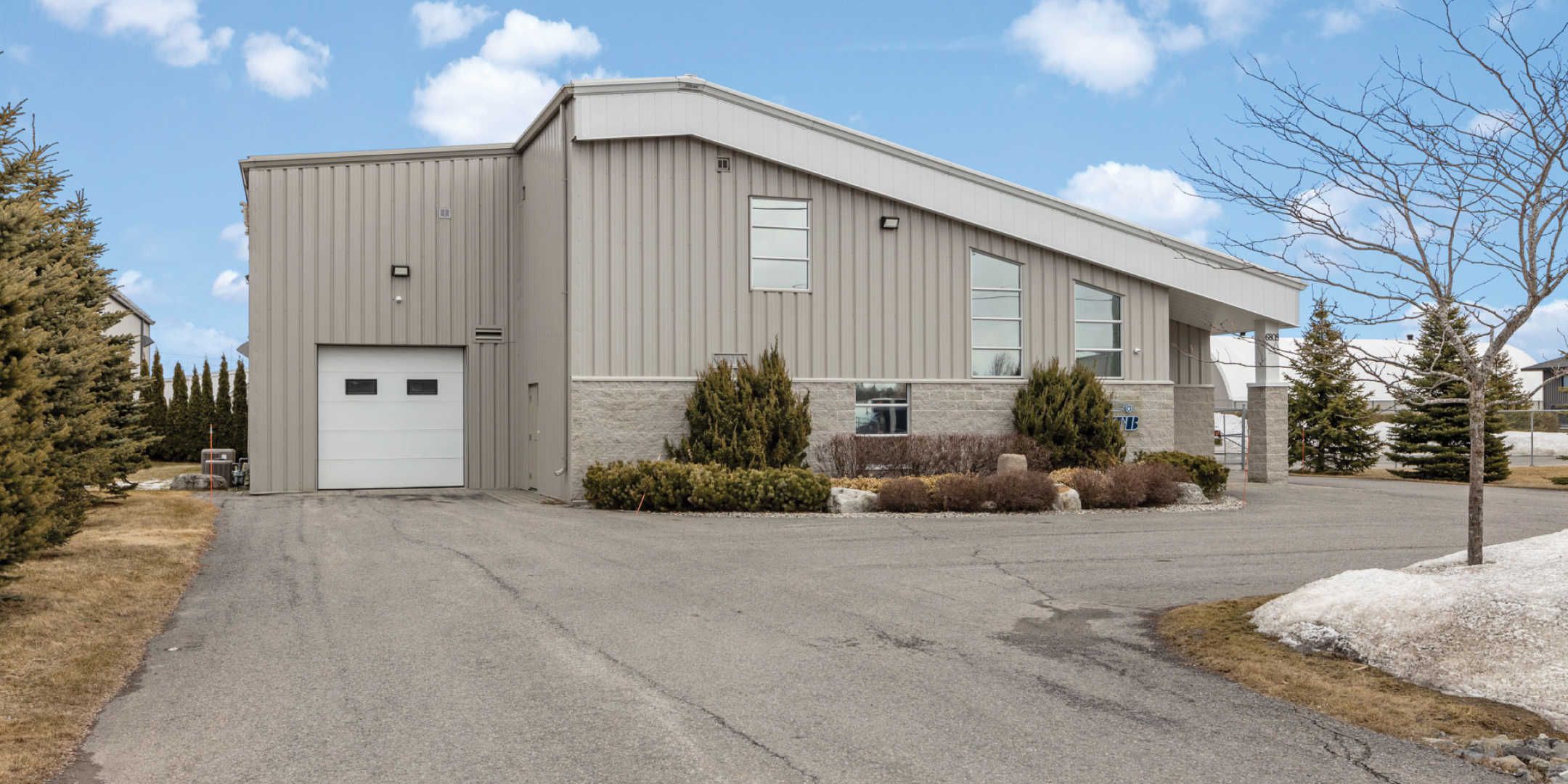 Back view of Main Building at 6798 & 6806 Hiram Drive