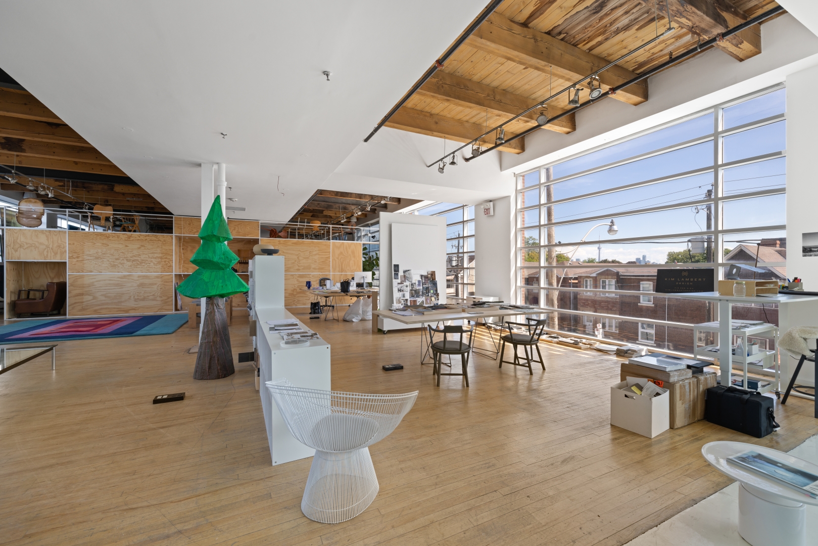 950 Dupont Street Open Space with a big window overlooking some chairs and decorations