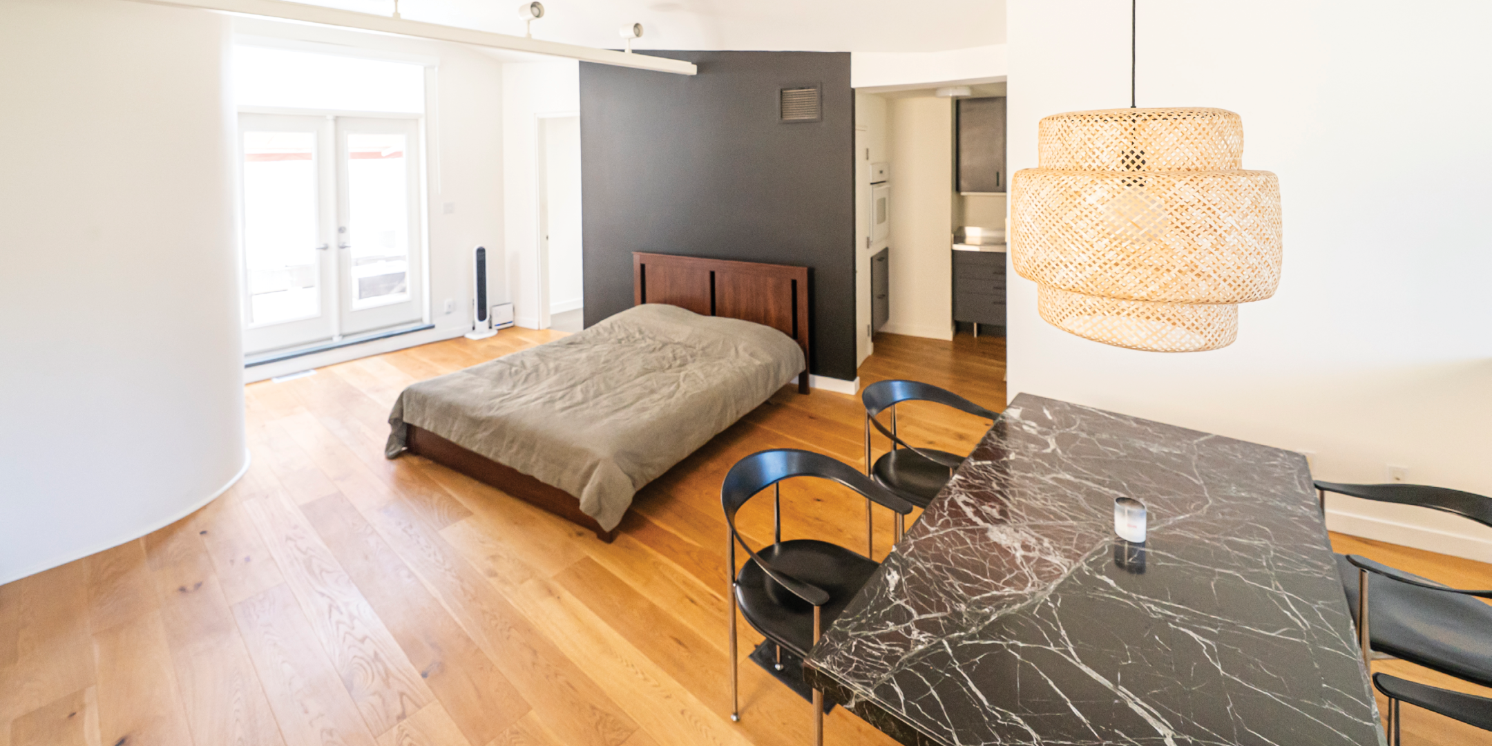 115 Walnut Ave third floor with bed and big windows