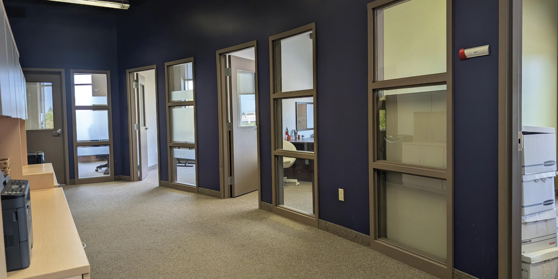 1250 Markham Road Office Area Hallway with Glass Office Doors