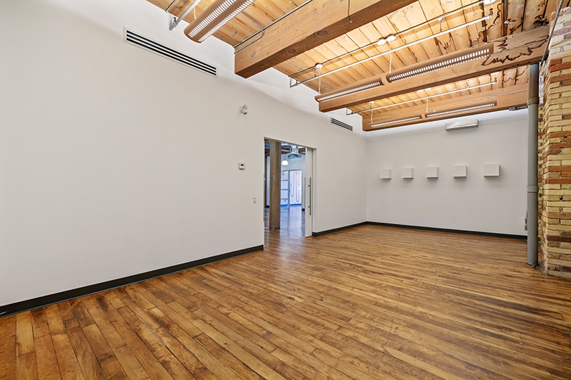 46 Spadina Avenue interior view of office with white wall and bright light