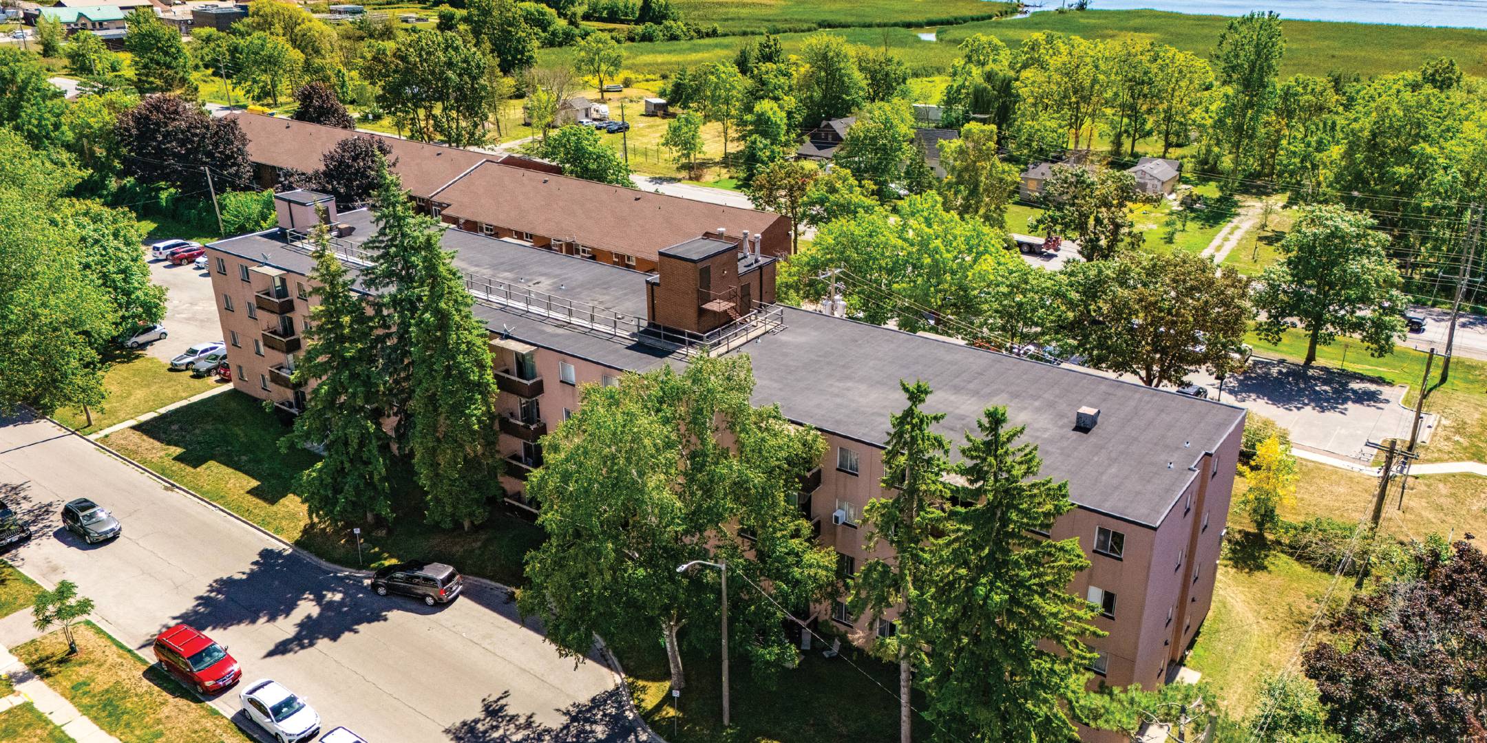 500 Queen aerial of building showing streets nearby and parking lot