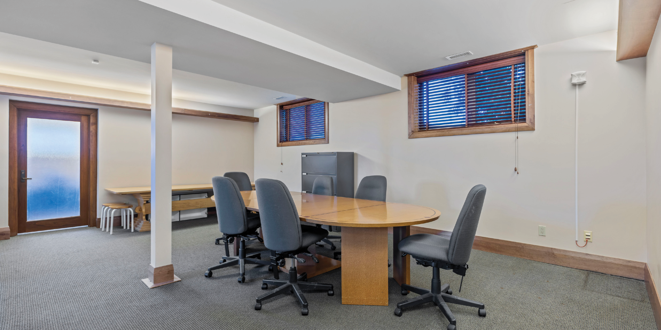 9835 Leslie Street Basement Area with Office chairs and desk