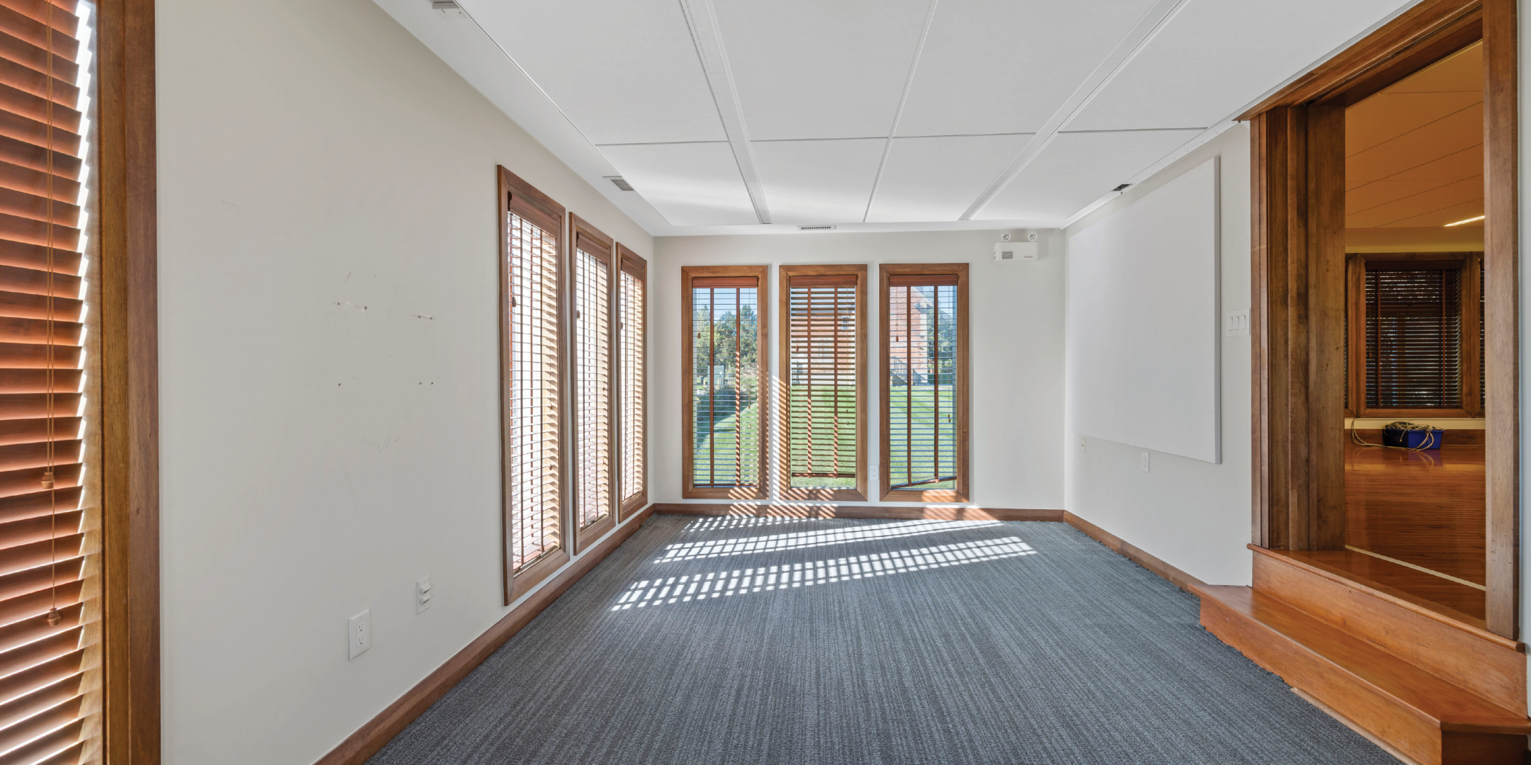 9835 Leslie Street Workspace area with hardwood floors and windows