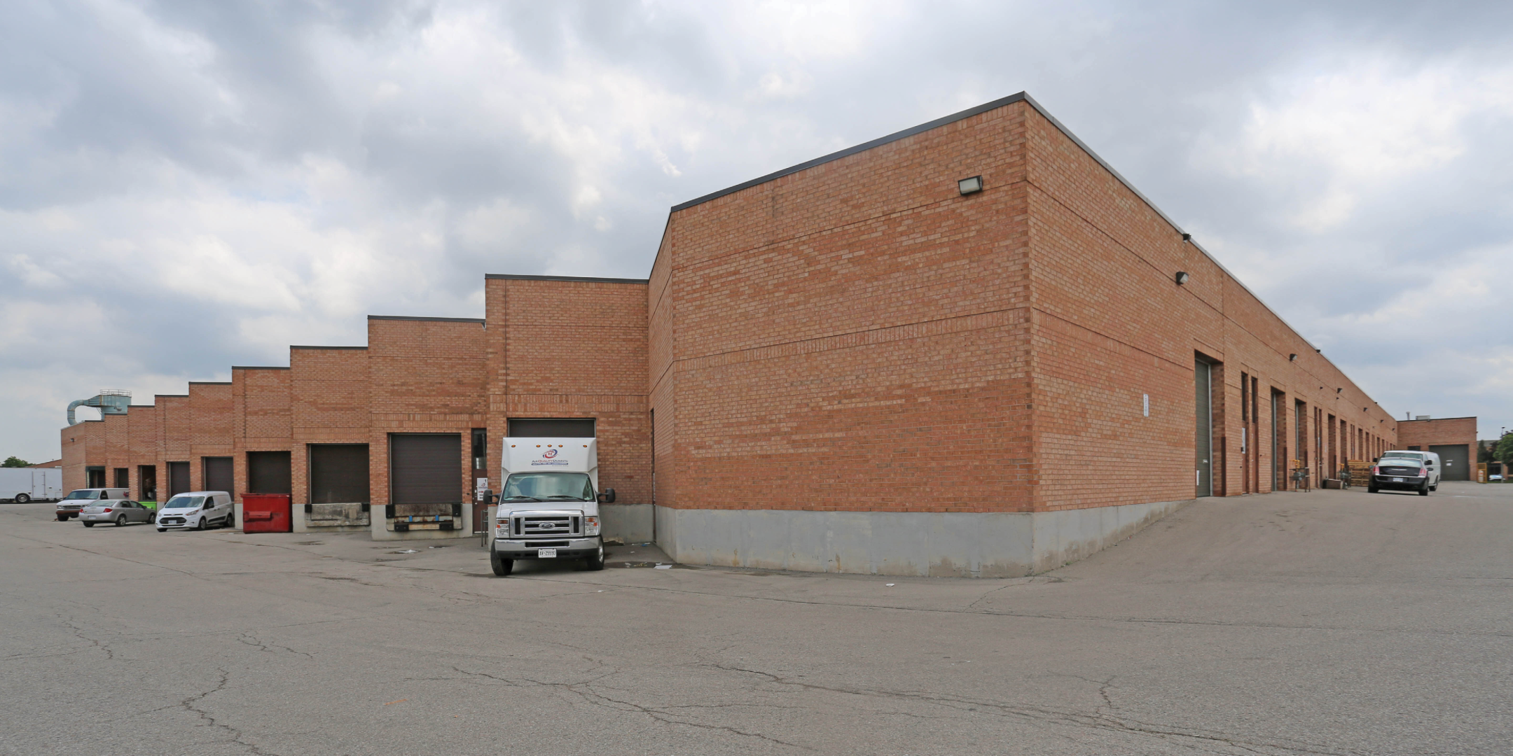 saw tooth shipping at back of industrial complex