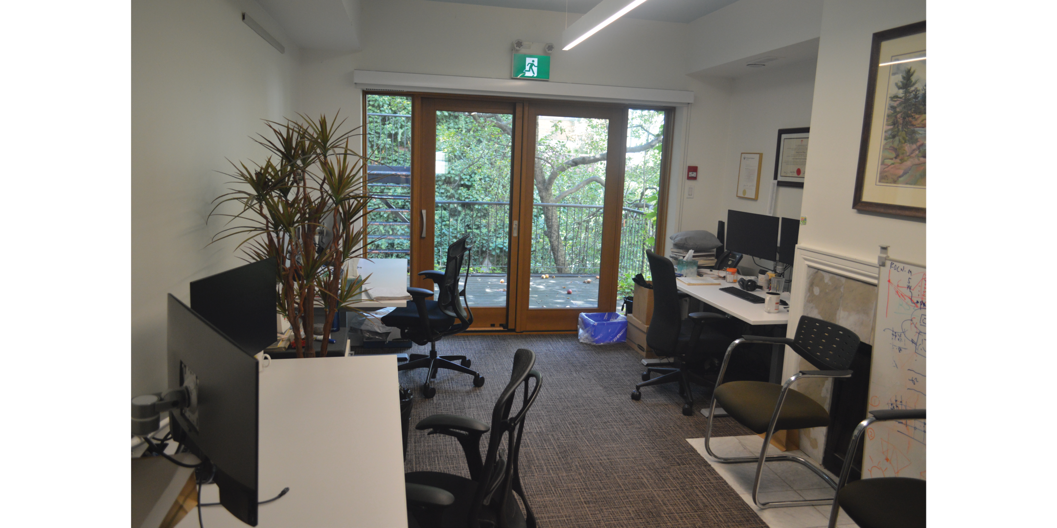 Open Concept room with several workstations