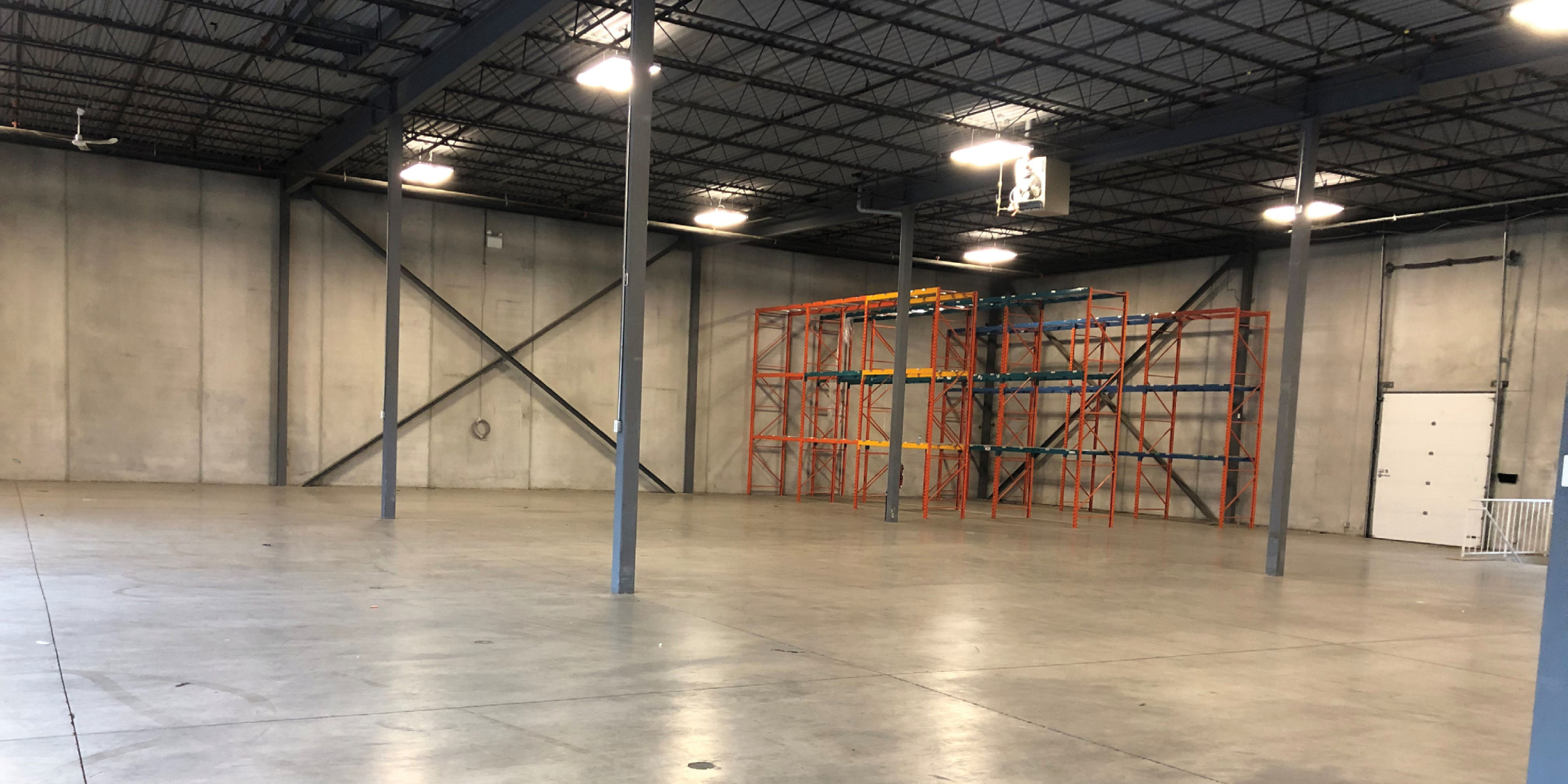 2036 Ellesmere Road Warehouse Area with Shipping Door
