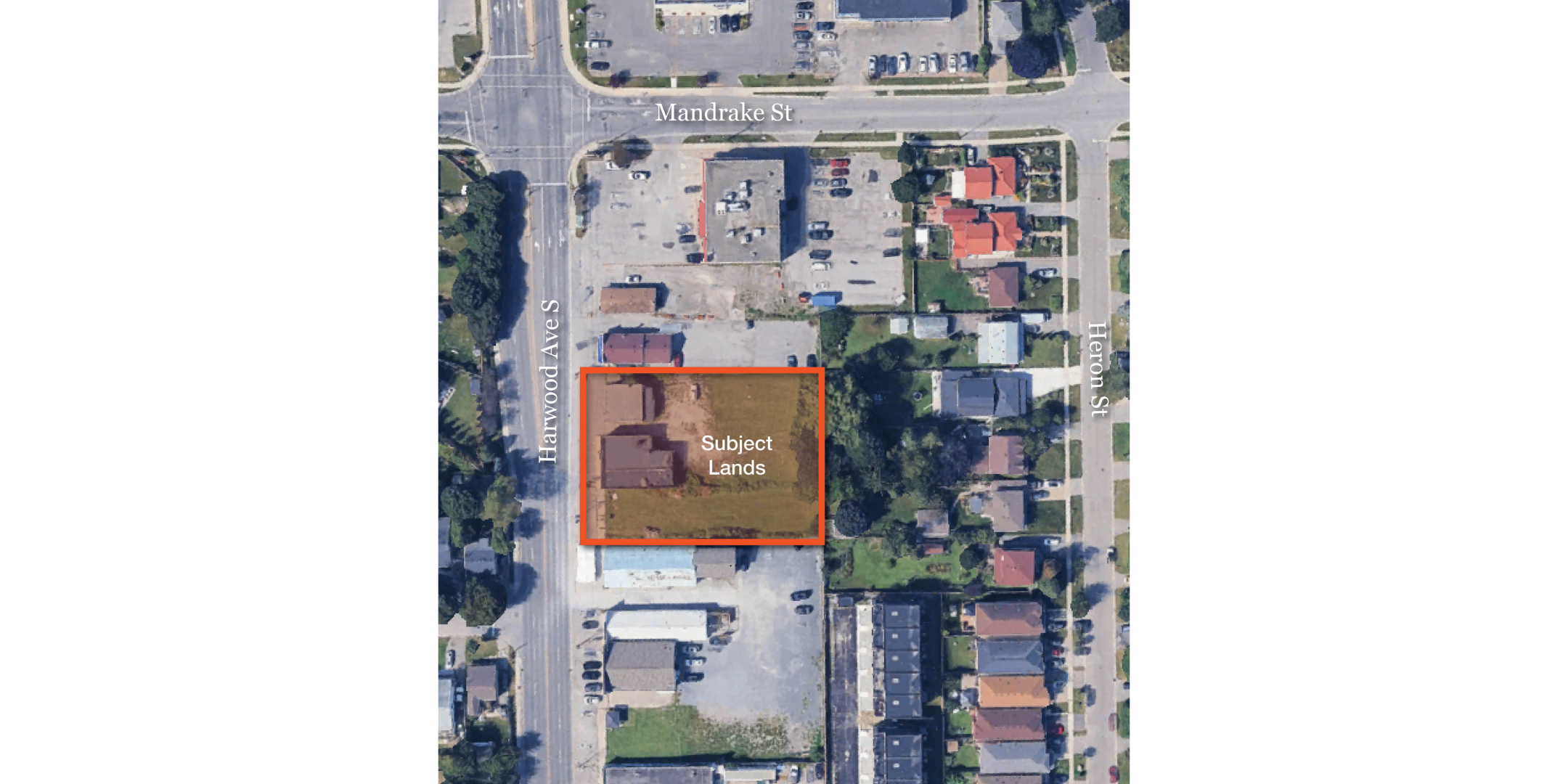 Aerial of site for sale with outline of property outlined and shaded in orange