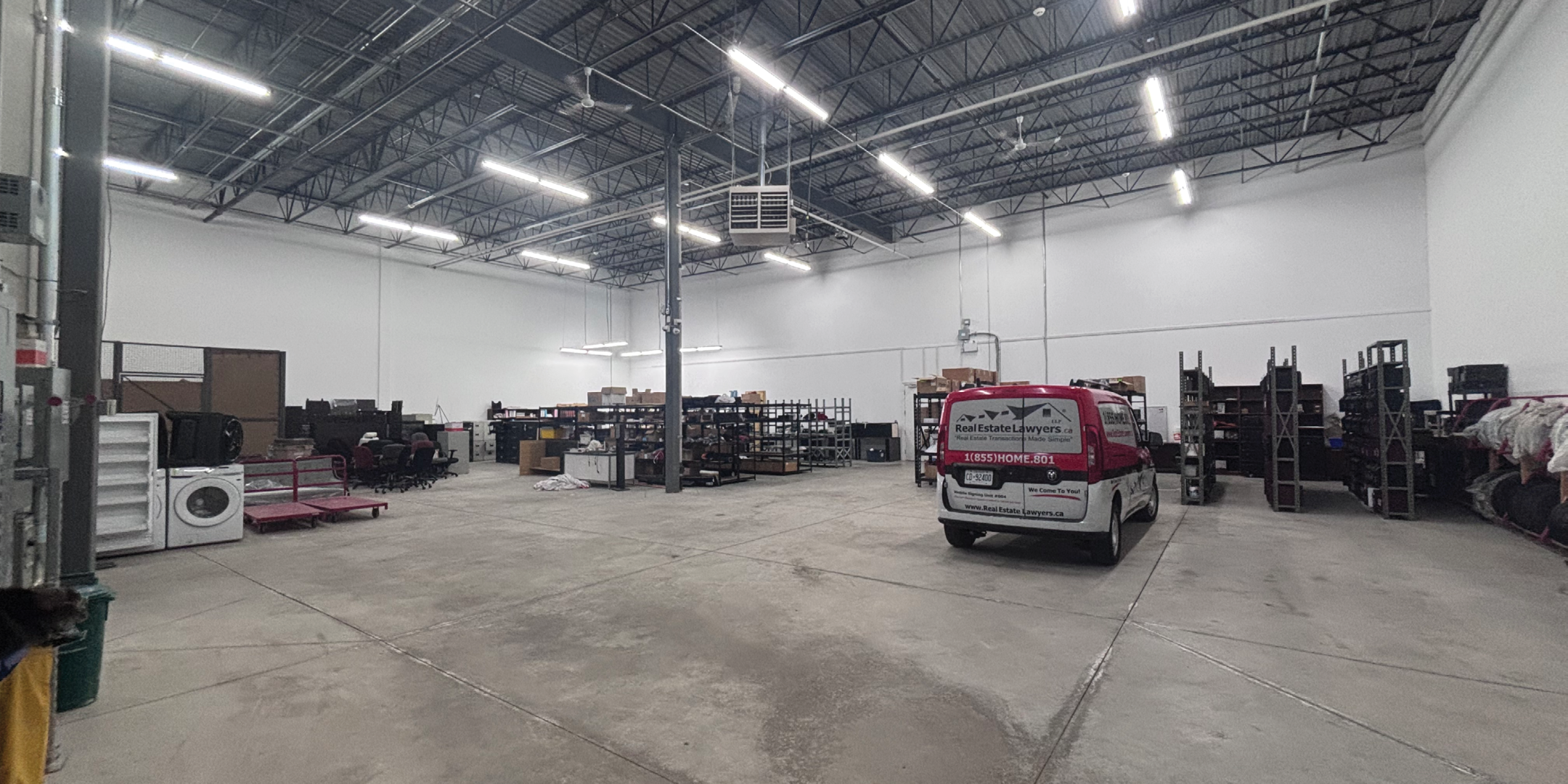 bright warehouse area with product and truck