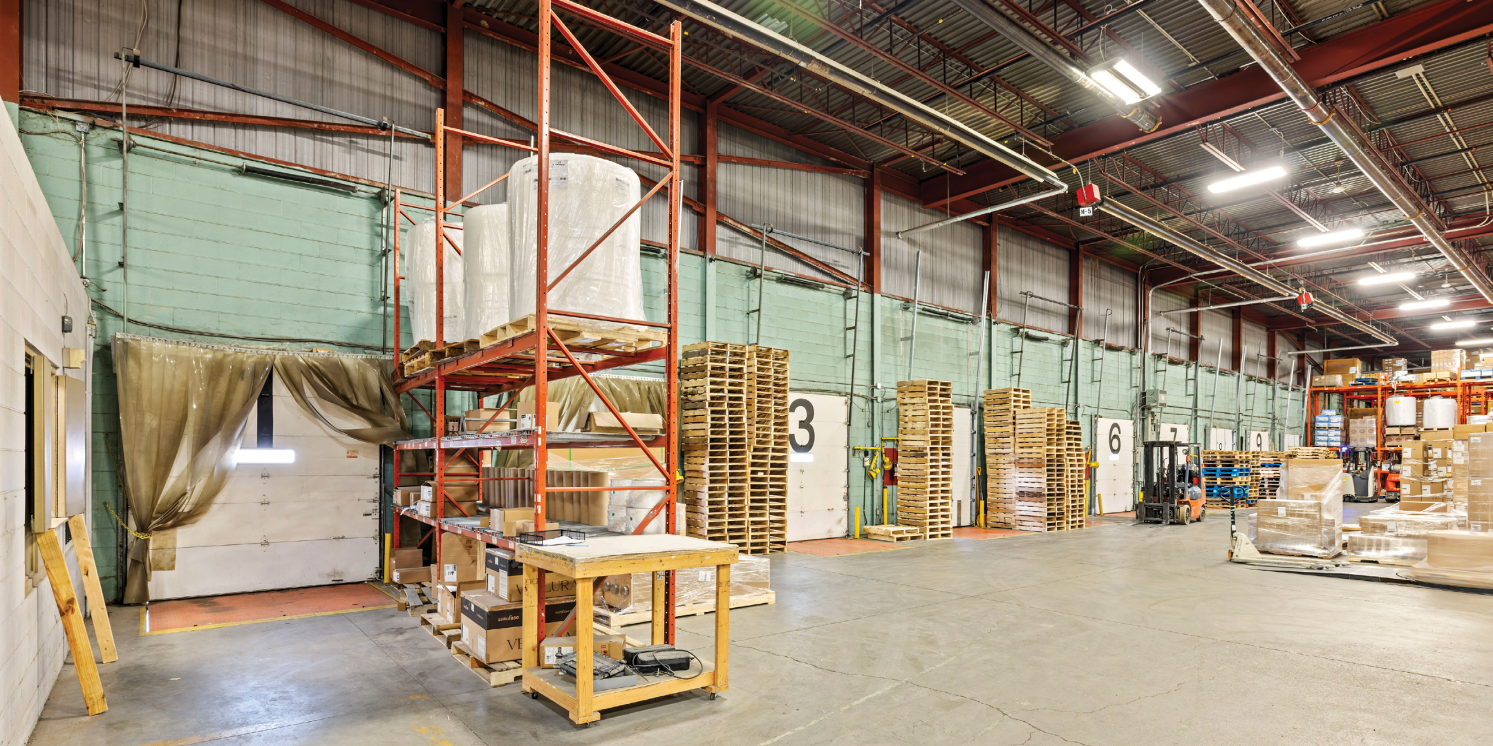 back of warehouse showing internal view of shipping doors