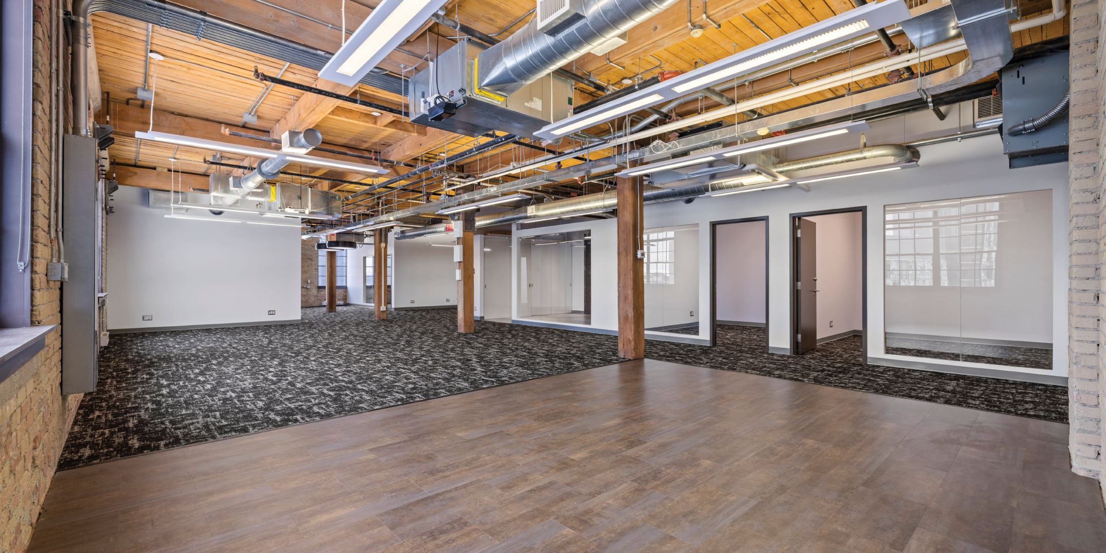 Open area with exposed ceilings