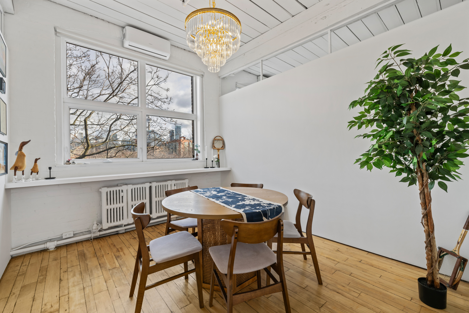 72 Stafford Street meeting room with window overlooking a round table and chairs