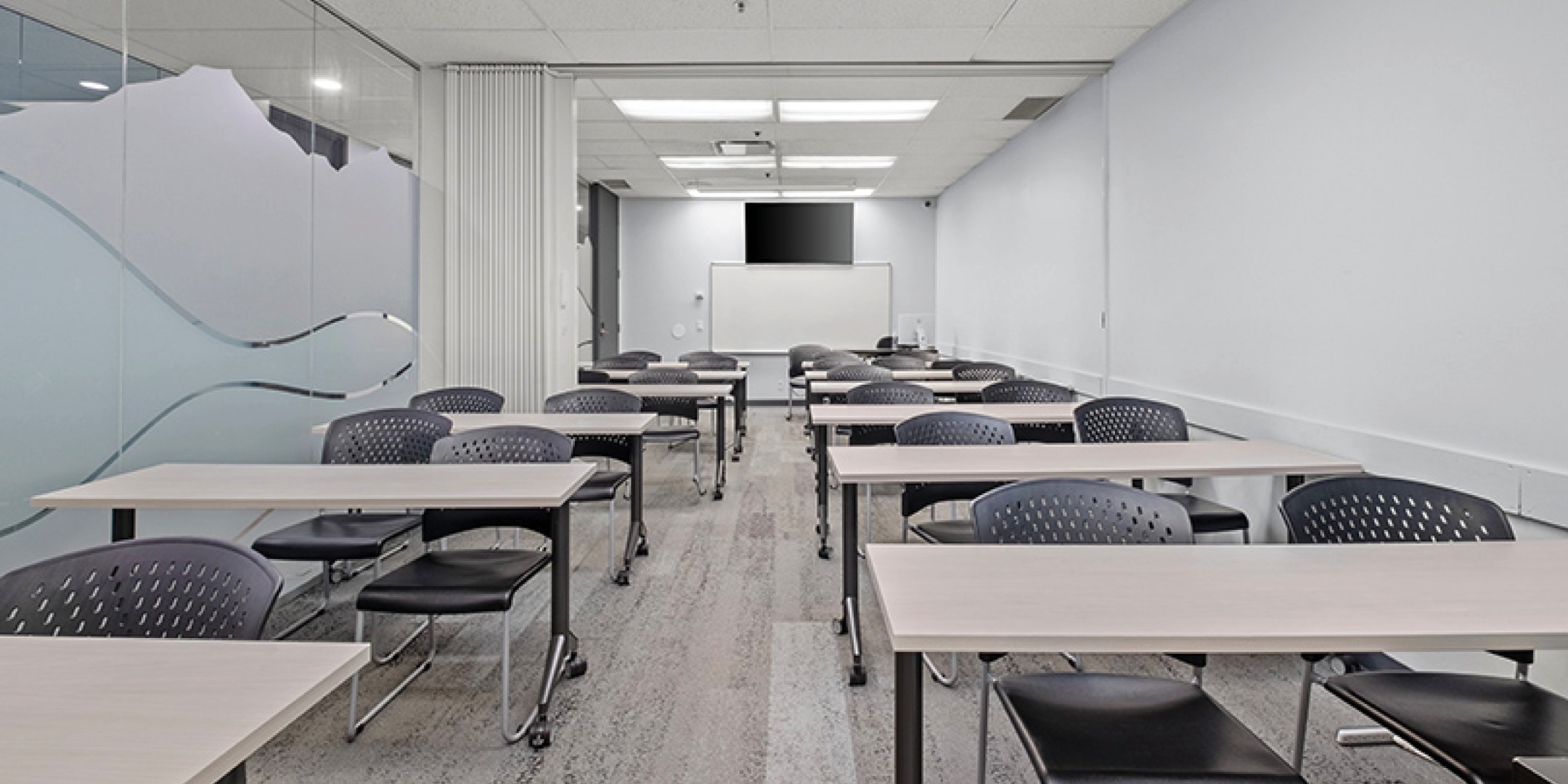 Classroom with whiteboard and desks