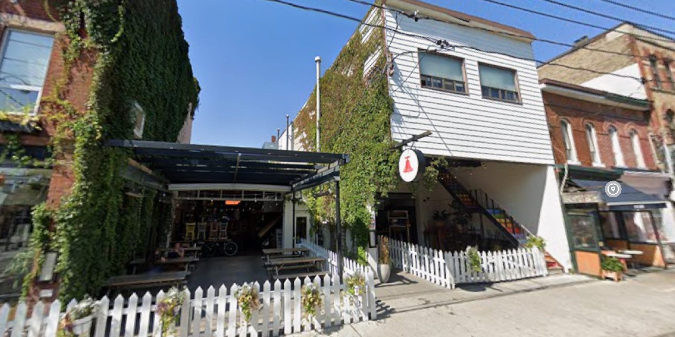 126 Ossington Avenue exterior showing staris and street