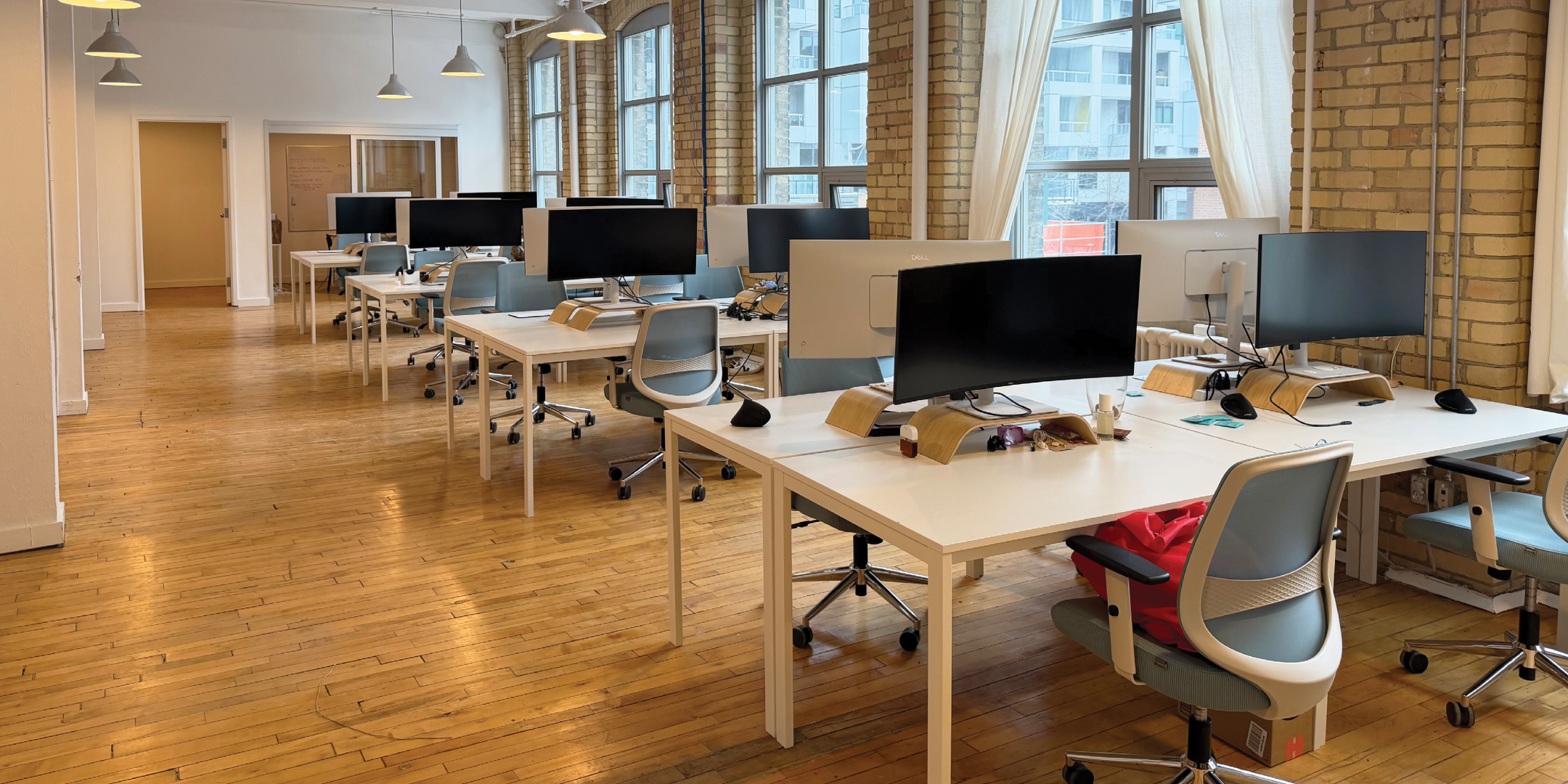 174 Spadina Avenue interior view of the open workstations with windows