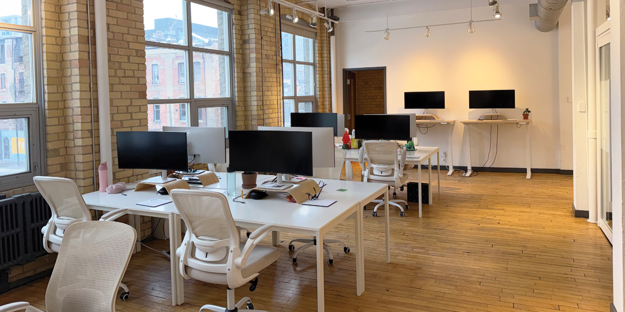 174 Spadina Avenue interior view of the open workstation with large windows