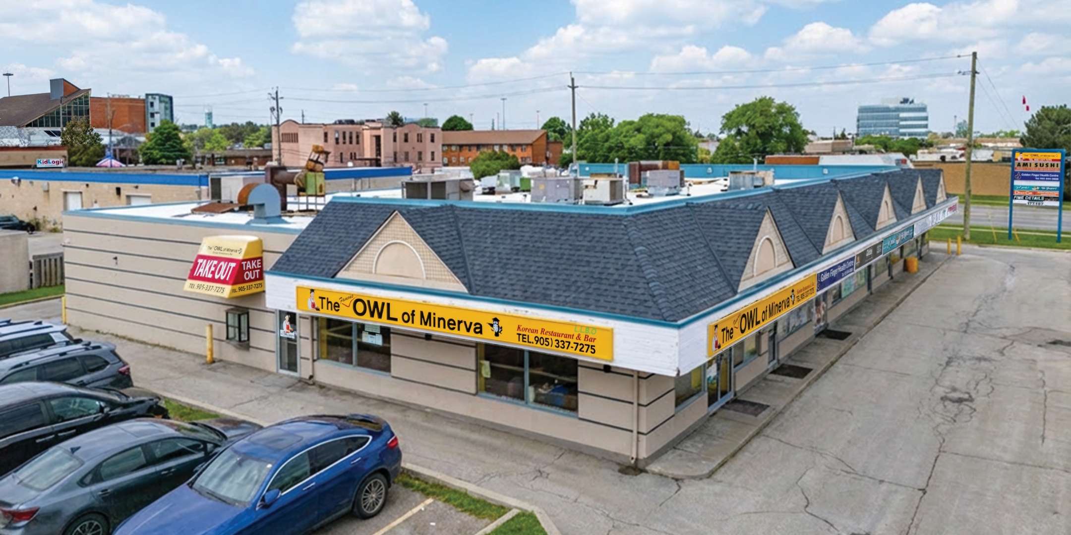 177-187 Cross Avenue and 580 Argus Road building exterior showing retail plaza