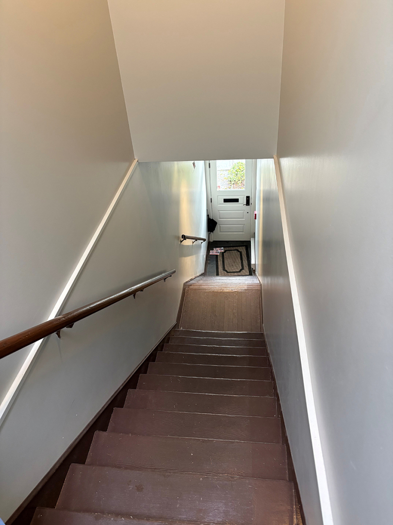 stairway of interior residential townhouse looking downwards