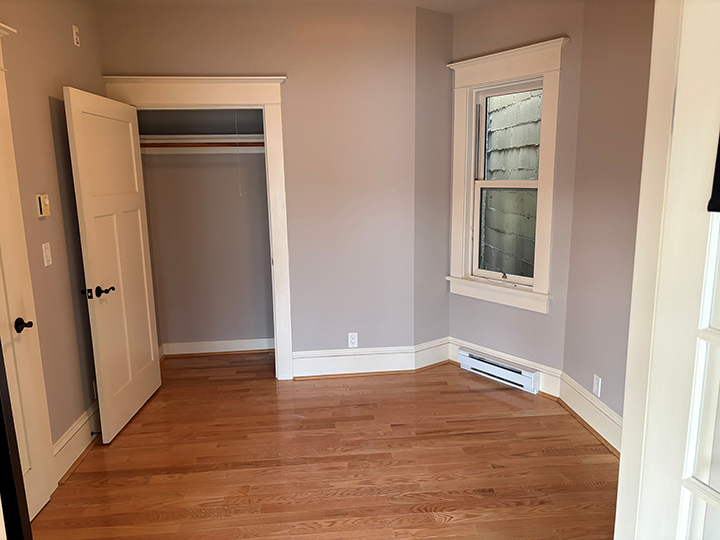 empty bedroom with angled walls