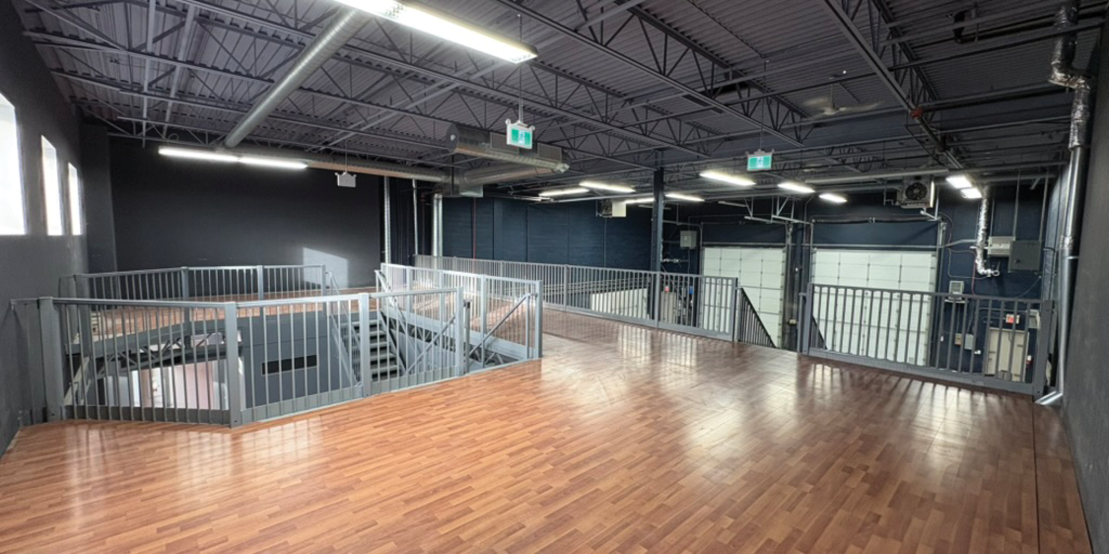 399 Four Valley Drive Office Area with hardwood floors and shipping doors