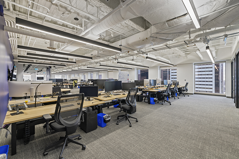 40 King St W interior view of open workstations with windows and bright lights