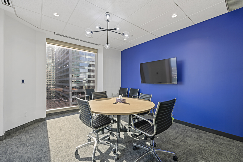 40 King St W interior view of conference room with blue wall and large window