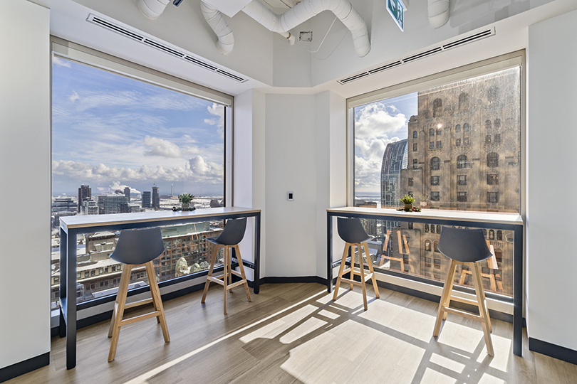 40 King St W interior view of desks with chairs facing large windows