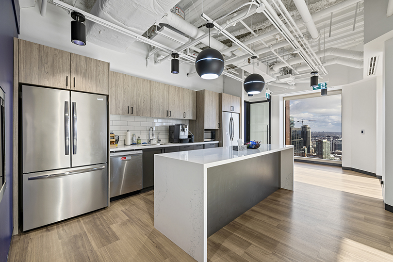 40 King St W interior view of kitchen area with large fridge