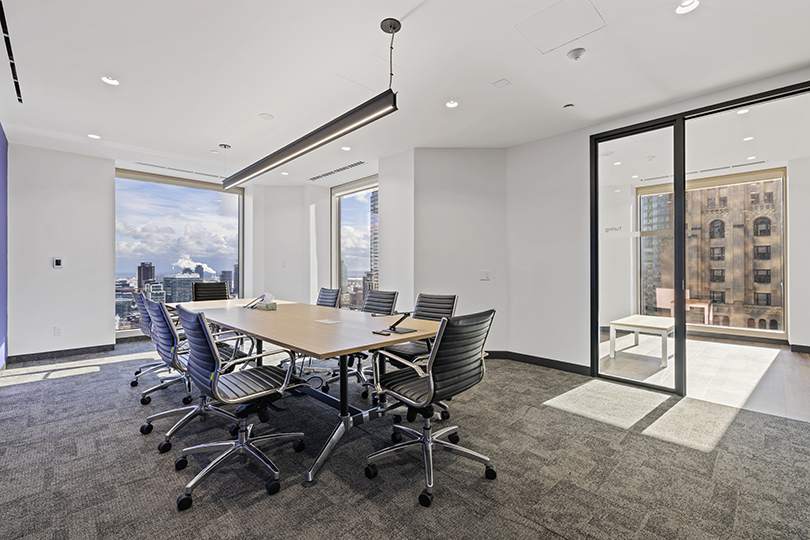 40 King St W interior view of the conference room with large desk and window and glass door