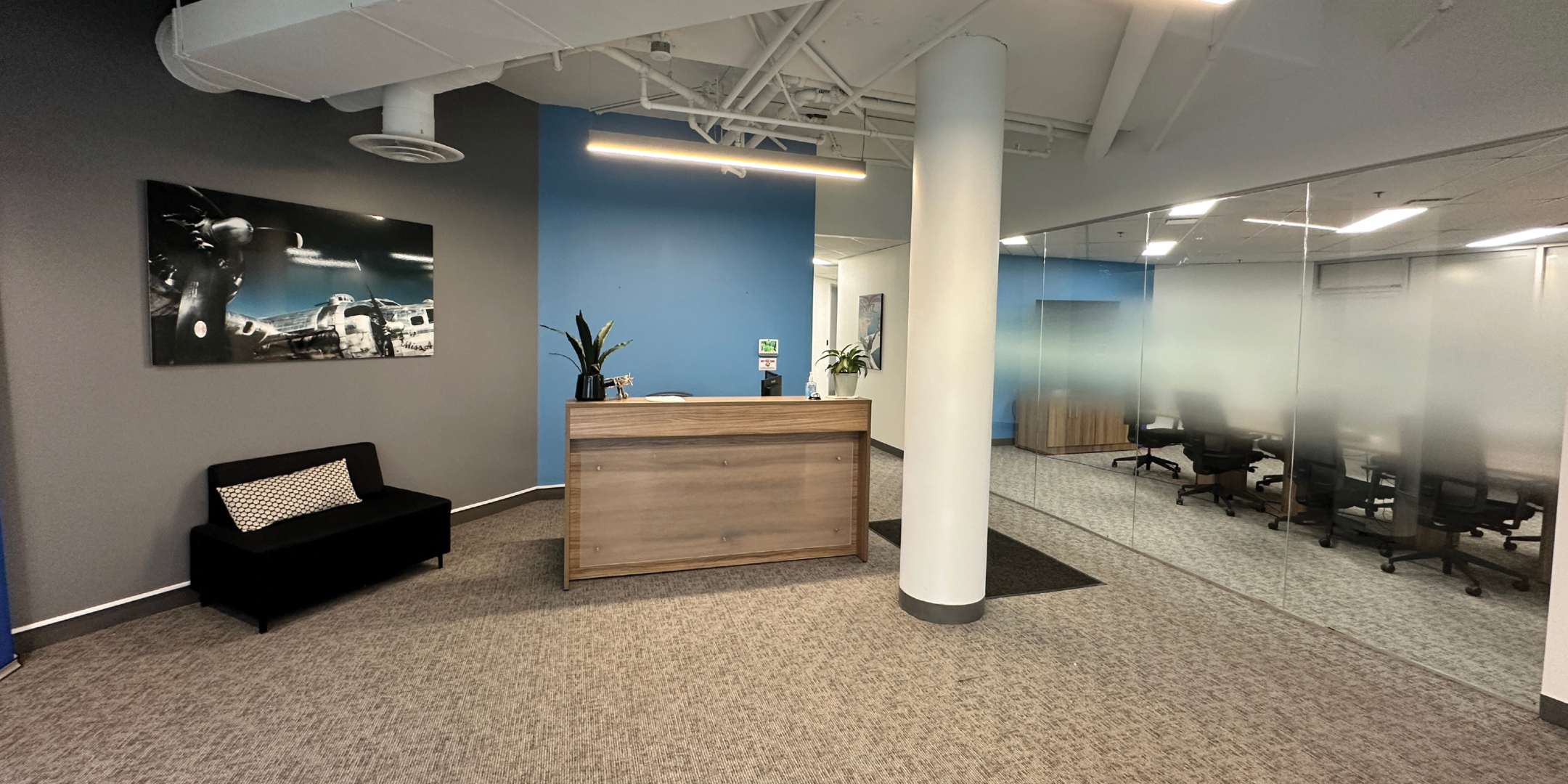 111 Gordon Baker Road reception area with sofa