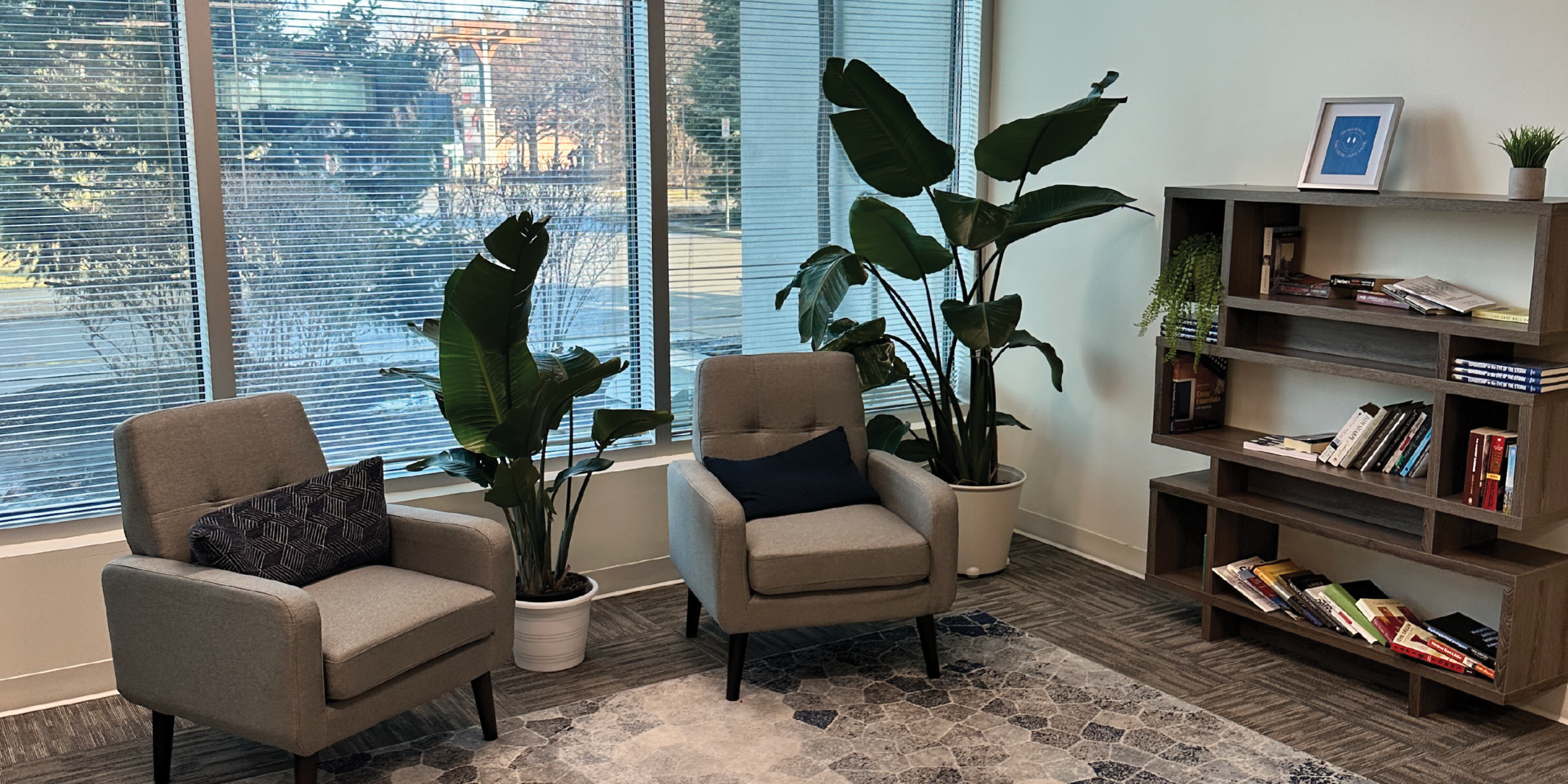 1540 Cornwall Road relaxing area with sofas and shelf