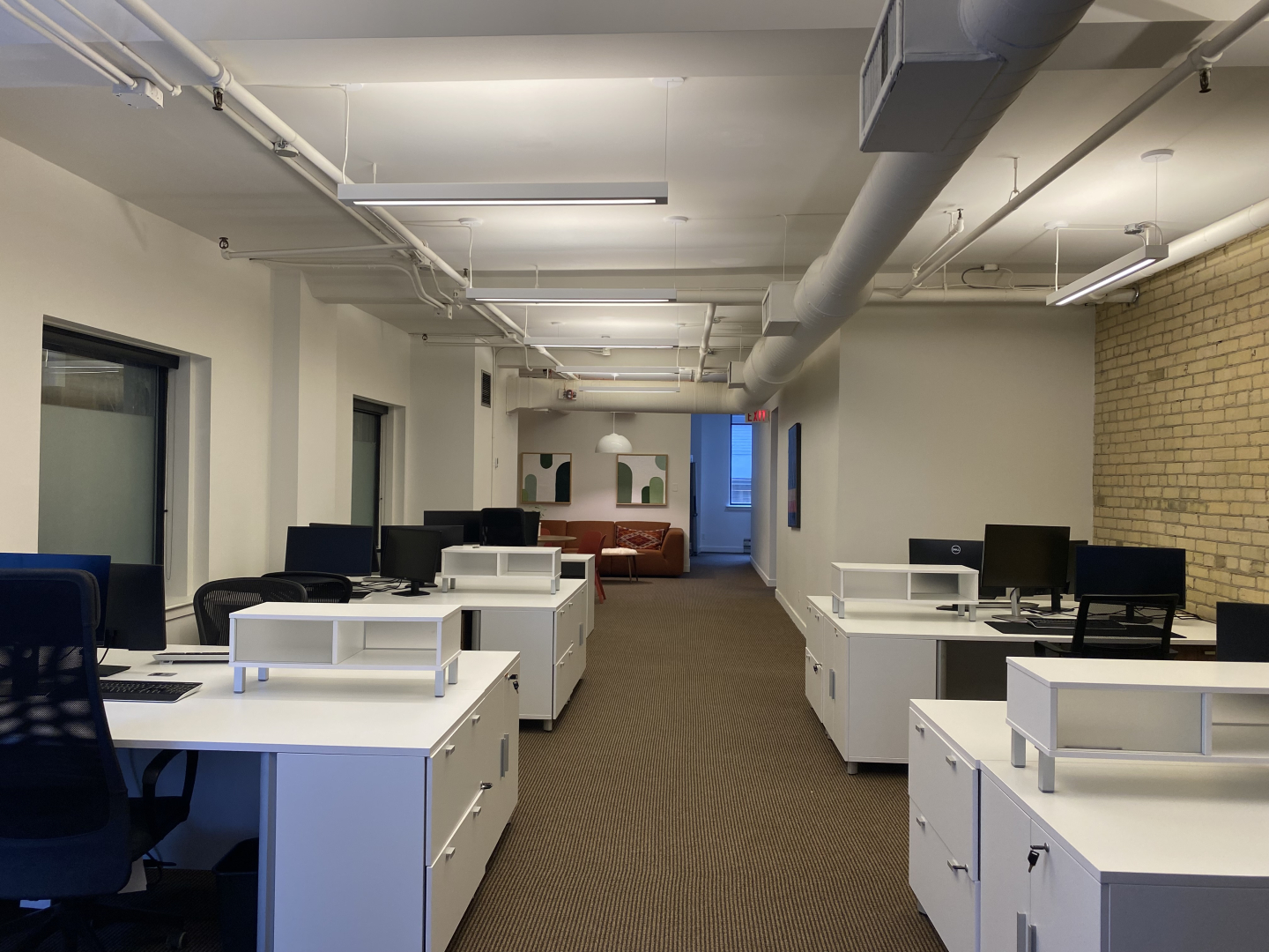 24 Dunan Street office space with white office desk and chairs