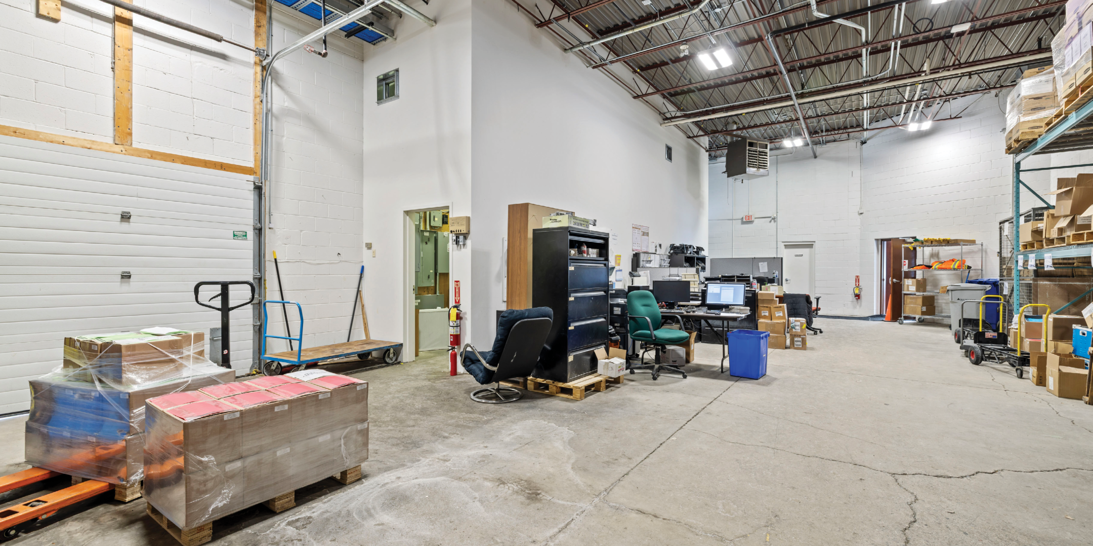 warehouse space with drive in door, and racking