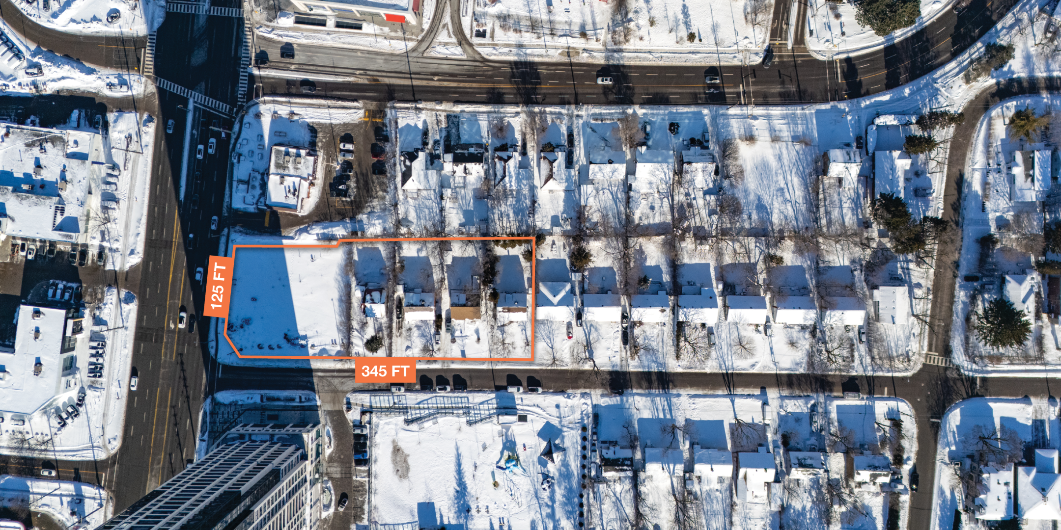 7115 Yonge St aerial view of the land with orange outline and beside empty area