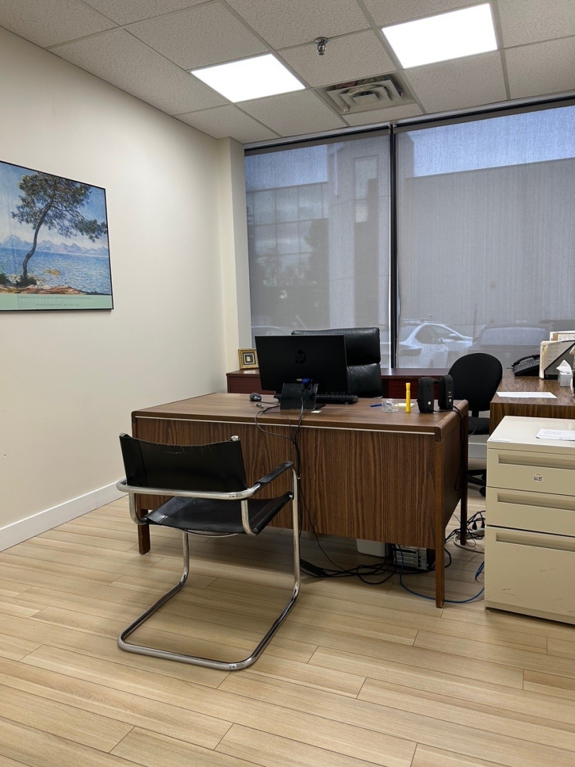 85 Scarsdale Road Interior private office with desk and chairs with cabinet on the side