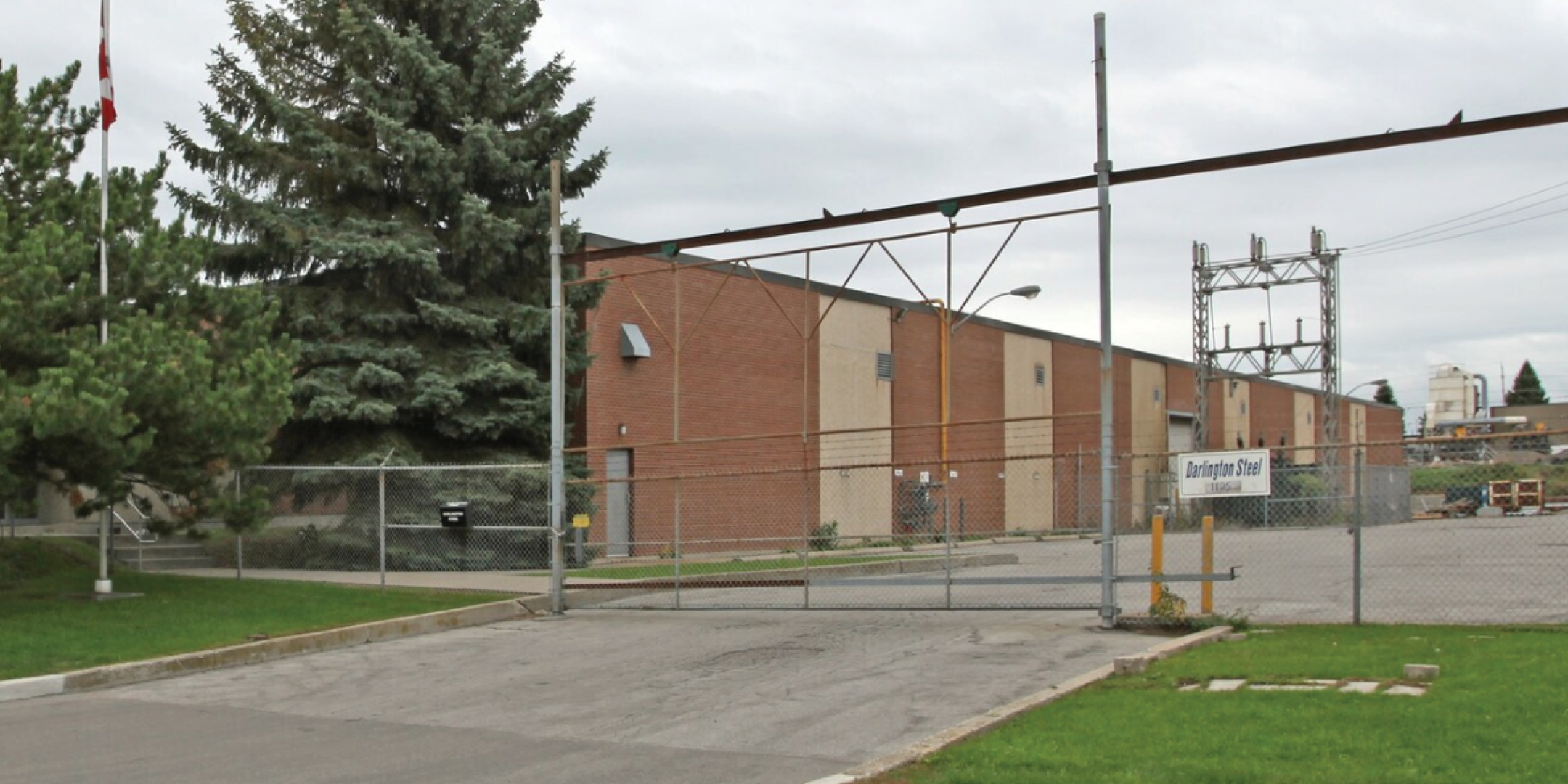 1125 Burns Street E building exterior with outer gate
