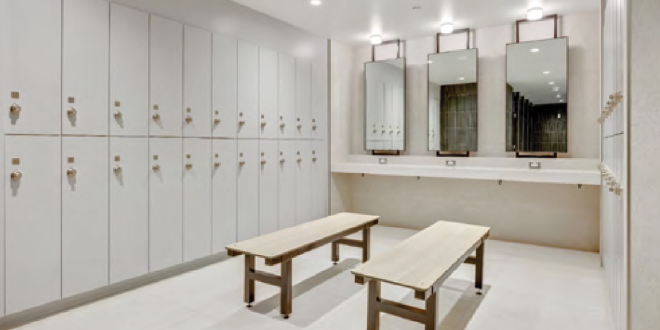 320 Bay Street change room with locker and mirro overlooking the chairs