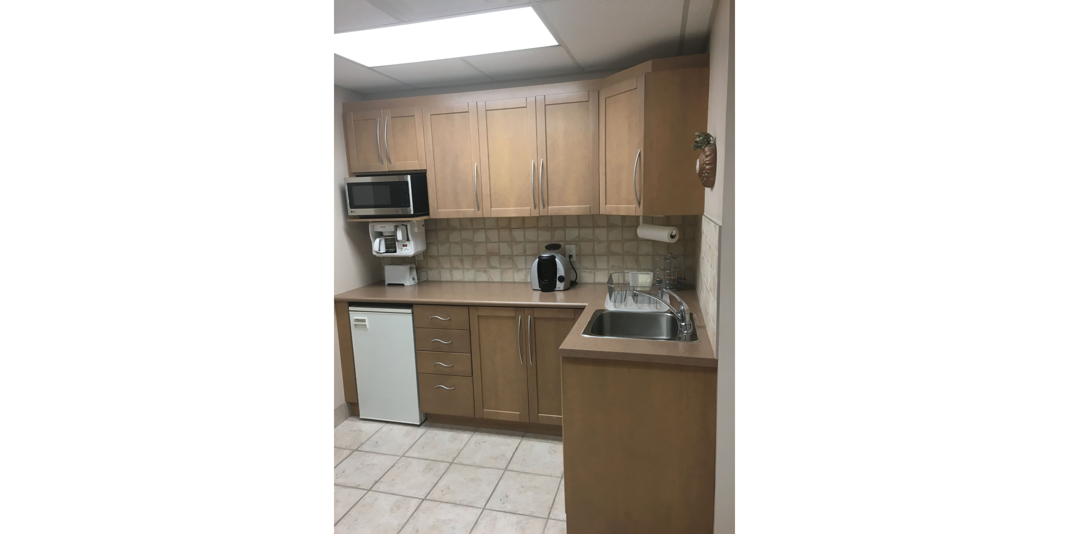 53 Woodstream Blvd Unit 7 kitchen with cabinet, sink and other kitchen appliances