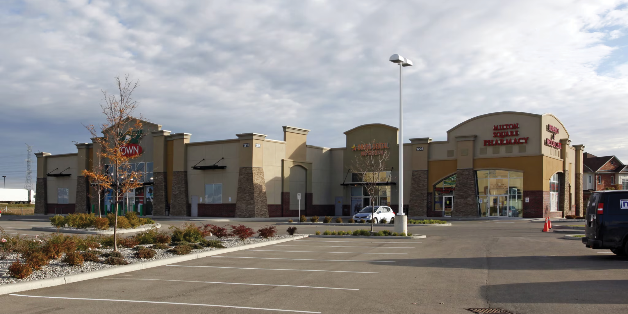 1195-1225 Maple Avenue exterior showing storefronts and parking