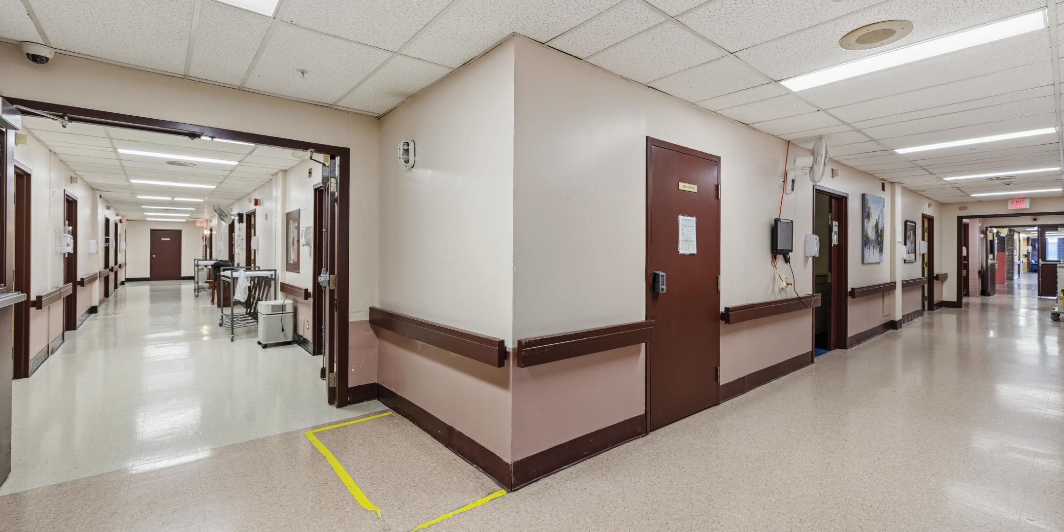 1195 Queen Street E hallway with multiple rooms and doors.