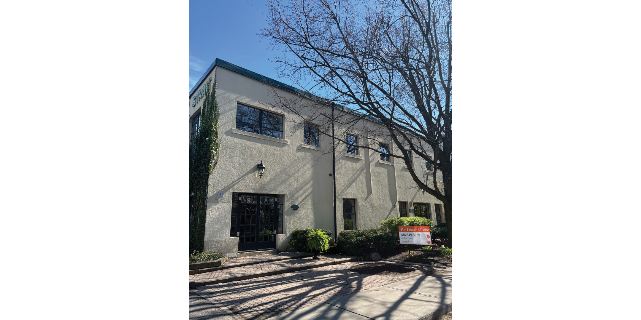 225 Macpherson Avenue showcases the exterior of a charming two-storey office building